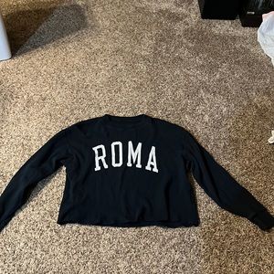 This Navy blue long sleeve tee is all the way from Italy. I out grew it.